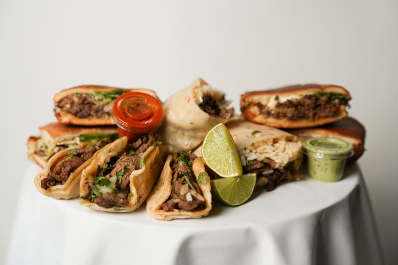 Full spread of tortas, tacos and burrito